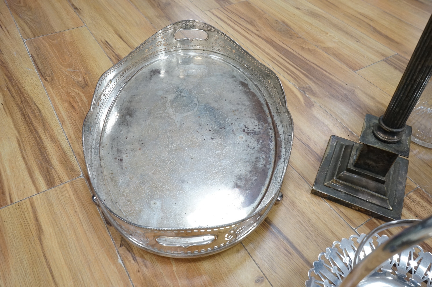 A collection of various silver plated wares including an Art Nouveau claret jug, trays, Corinthian column table lamp etc. Condition - varies